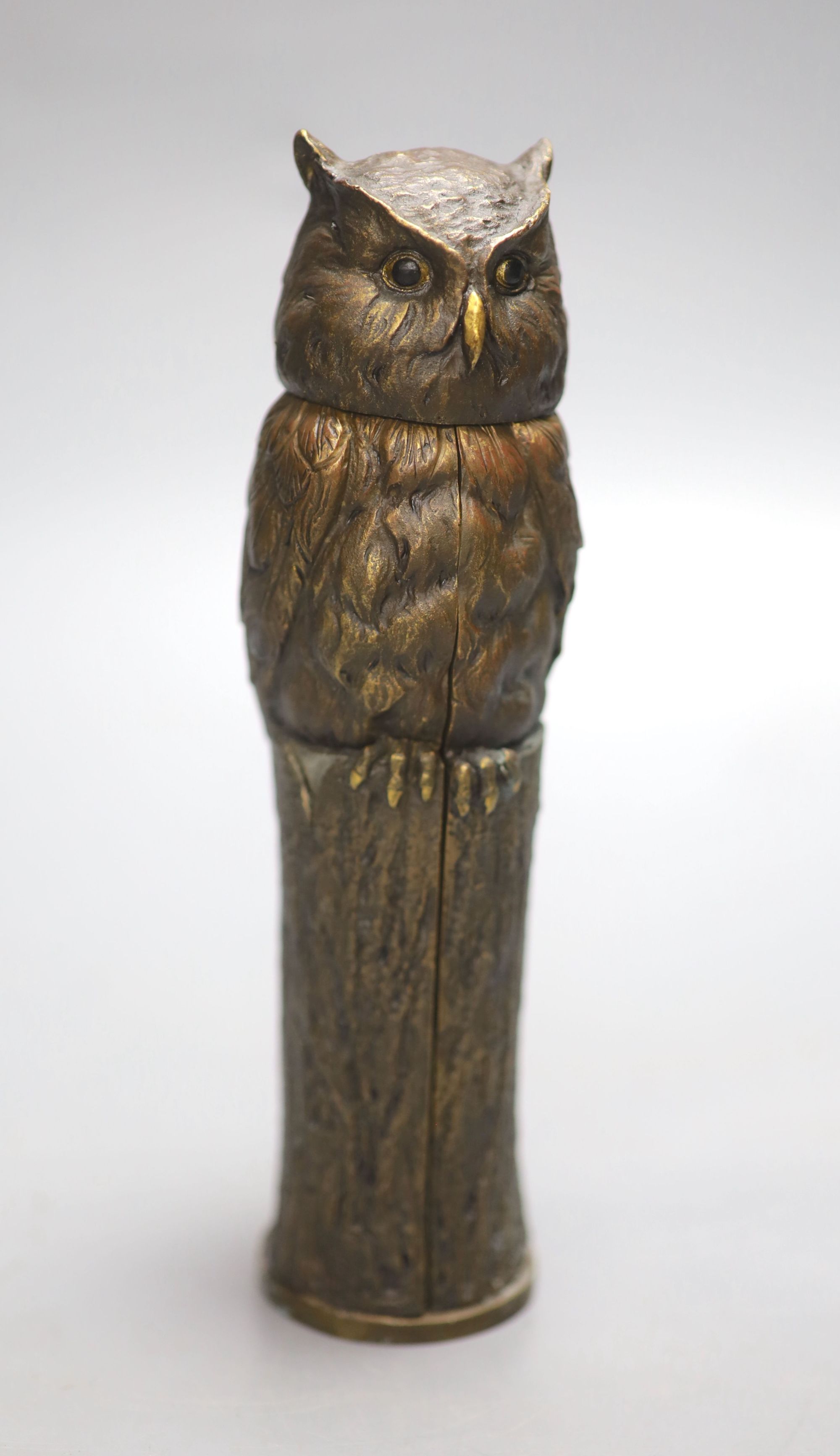 After Bergman. A bronze of an owl embracing a nude lady, height 19cm